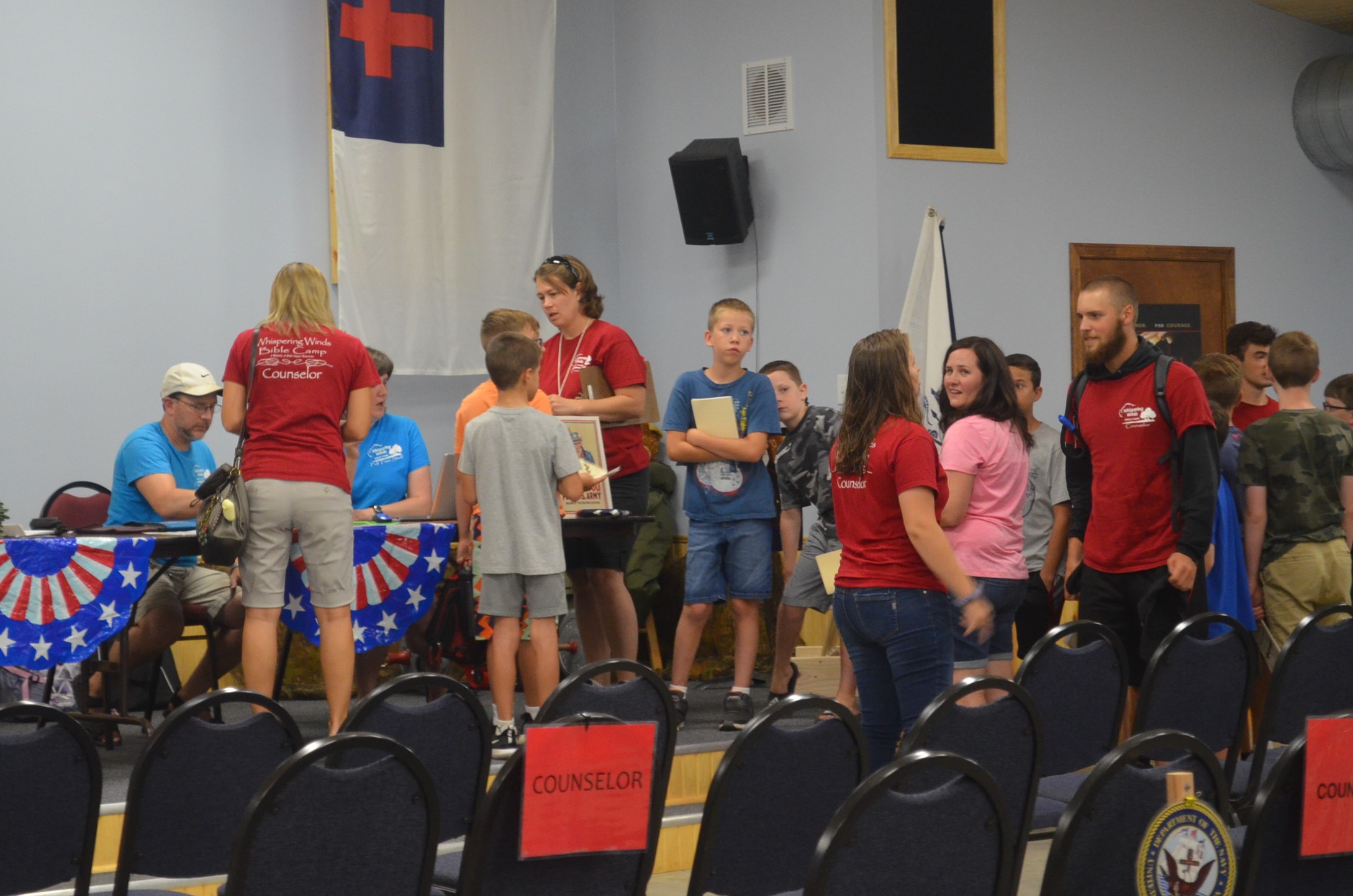 Image of campers and parents at registration