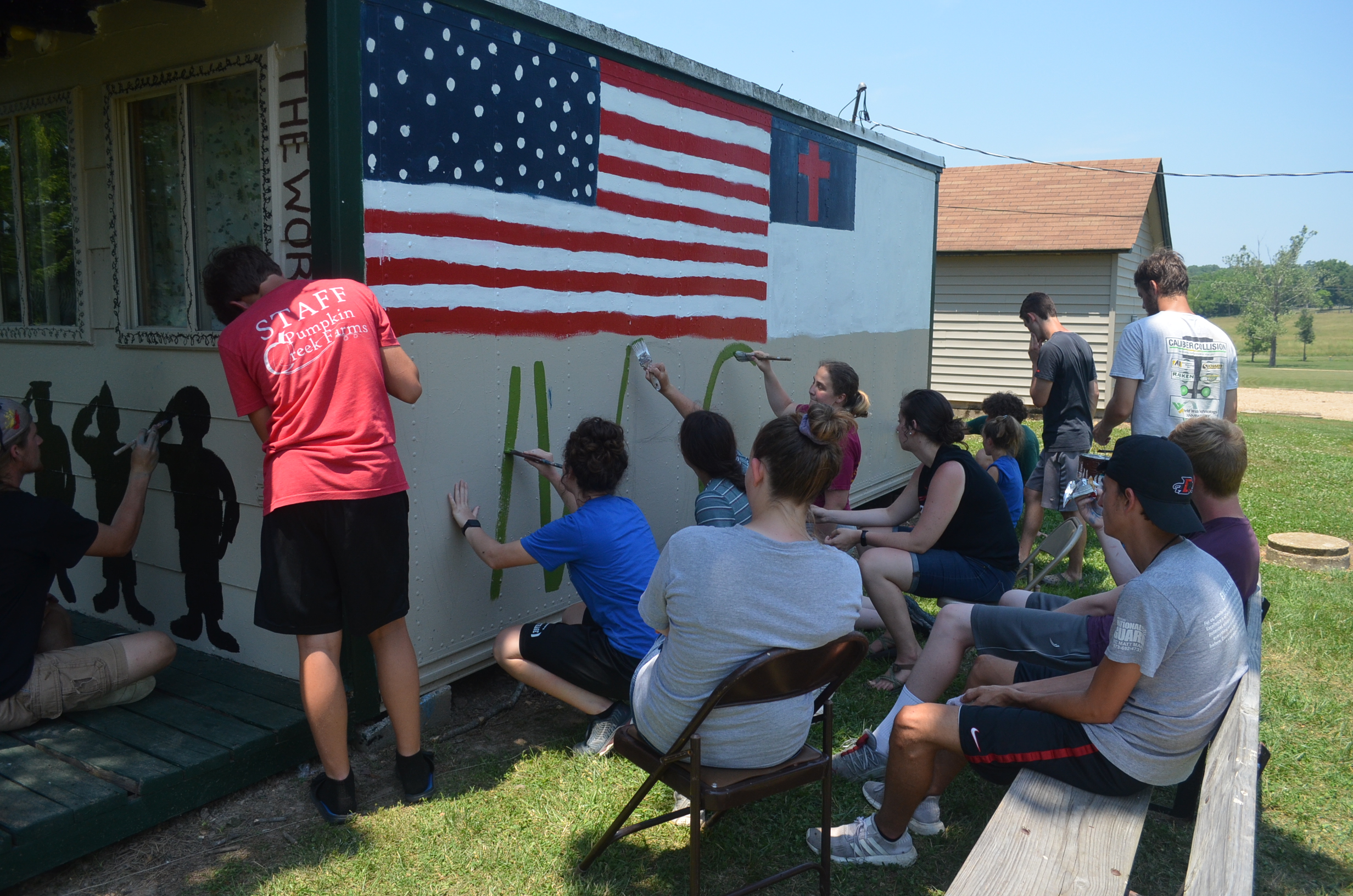 Image of the Summer Staff painting the Snack Shop